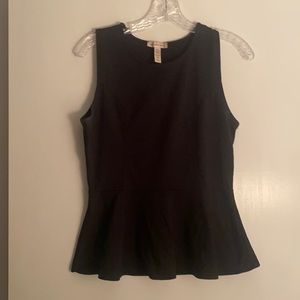 Sleeveless black peplum top